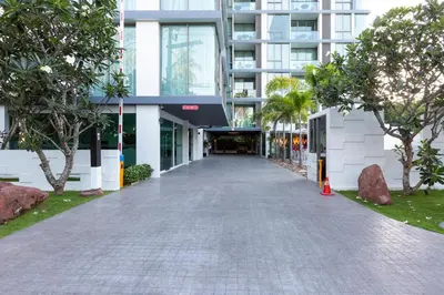 an empty street in front of a building at Oceanstone by Holy Cow, 1-BR, next building view in Bang Tao Beach