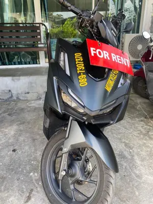 a motor scooter with a for rent sign on it at Hero Phuket in Nai Yang Beach