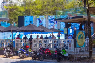 a group of motorcycles parked under umbrellas at a show at Grand Kata VIP - Kata Beach in Kata Beach