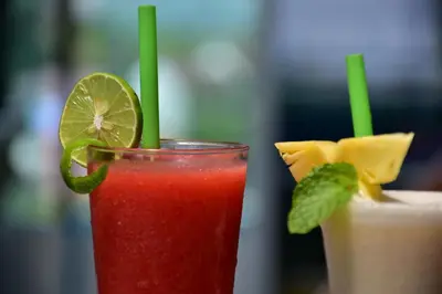 two smoothies with lime and mint on a table at Layalina Hotel in Kamala Beach