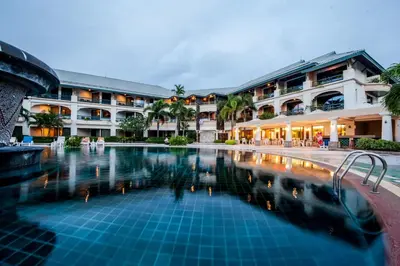 a swimming pool in front of a hotel at Phi Phi Island Cabana Hotel in Phi Phi Don
