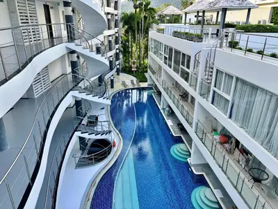 an overhead view of a pool on a cruise ship at Sunset Plaza by RESAVA in Karon Beach