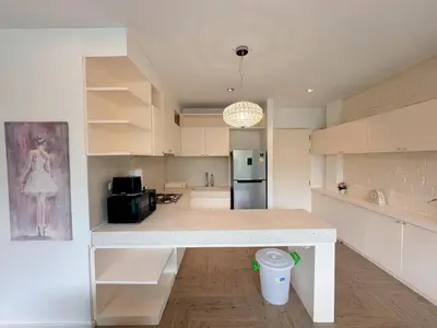a kitchen with a white counter top in a room at Peaceful Bliss in 81sqm Top Floor in Kamala in Kamala Beach