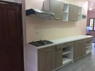 a kitchen with a stove and a counter top at Villa Kamala Beach in Kamala Beach