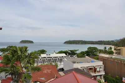a view of the ocean from a city at Da Bungalows in Kata Beach