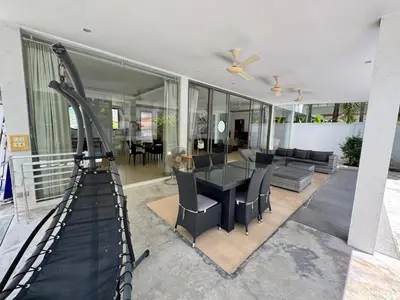 a house with a gym with a treadmill at Miguel Villa by G Estate in Nai Harn Beach