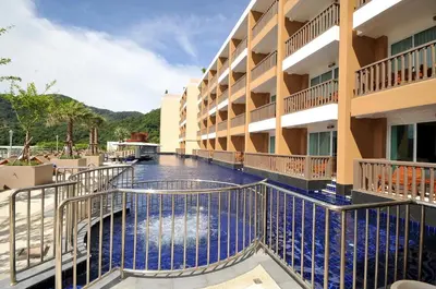 a view from the balcony of a hotel with a swimming pool at Princess Seaview Resort & Spa - SHA Plus in Karon Beach