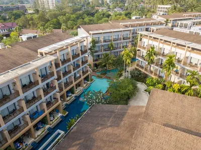 an aerial view of a building with a swimming pool at Deevana Plaza Krabi Aonang in Ao Nang Beach
