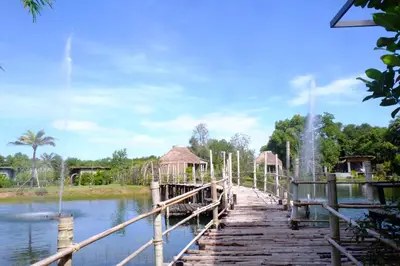 a bridge over the water at a water park at Awana Villa Resort Yaonoi - SHA Extra Plus in Ko Yao Noi