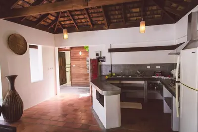 a kitchen with a sink and a counter top at Koyao Bay Pavilions - Beach Resort and Pool Villas in Ko Yao Noi