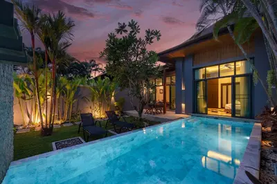 a swimming pool in the backyard of a house at VILLA AWA Private Pool Naiharn beach in Rawai Beach