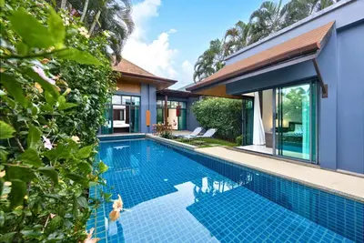 a swimming pool in front of a house at Villa Hahana Private Pool Near Nai Harn Beach in Rawai Beach