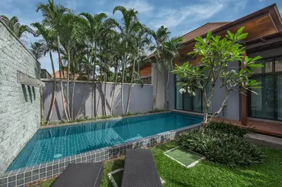 a swimming pool in the backyard of a villa at VILLA JAVA Private Pool Nai Harn Beach in Rawai Beach