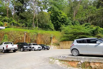a group of cars parked in a parking lot at Emerald Terrace Patong in Patong Beach