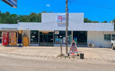 a gas station with a sign in front of it at Boodsarin Hotel in Ko Yao Yai