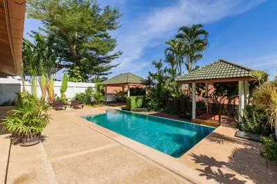 a swimming pool in a yard with a gazebo at Aster Pool Villa Your Tropical Villa In Paradise in Rawai Beach