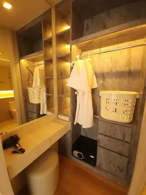 a bathroom with a sink and a toilet in a room at Kamala Regent Residence in Kamala Beach