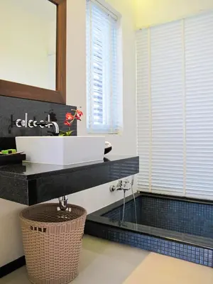 a bathroom with a sink and a mirror at Villa 4 Bedrooms with private pool at Oxygen Bangtao in Bang Tao Beach