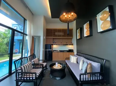 a living room with a couch and chairs and a table at Villa 3 Bedrooms with private pool at Wings Pasak in Bang Tao Beach