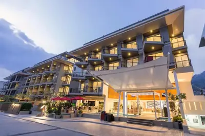 a large building with a lot of windows at Luxury Beach Apartments by MVP in Patong Beach