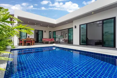 a swimming pool in the backyard of a villa at Large 3br Boutique Villa with big Pool by Intira Villas in Rawai Beach