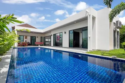a swimming pool in the backyard of a villa at Large 3br Boutique Villa with big Pool by Intira Villas in Rawai Beach