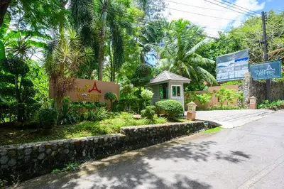 a house on the side of a road at Thai Modern Resort & Spa 