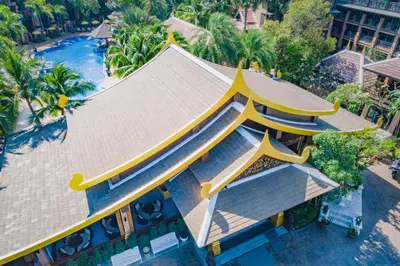 an overhead view of a building with a roof at Princess Kamala Beachfront Hotel - SHA Extra Plus in Kamala Beach