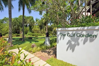 a sign for the carat garden at the carat garden at Marriott's Mai Khao Resort - Phuket in Mai Khao Beach