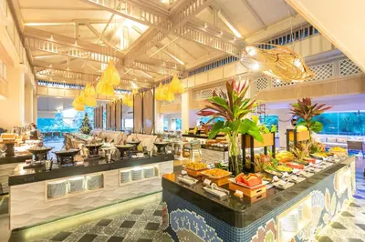 a buffet in a hotel with food on display at Marriott's Phuket Beach Club in Mai Khao Beach