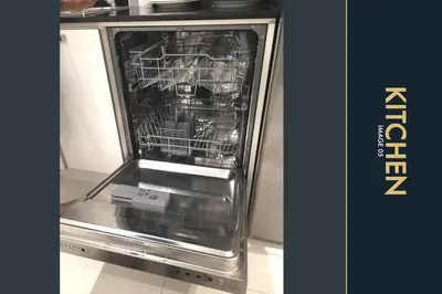 a dishwasher with its door open in a kitchen at 3 BR Stylish Condo with Private Rooftop Pool in Kamala Beach