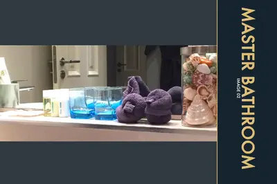 a bathroom counter with purple stuffed animals on it at 3 BR Stylish Condo with Private Rooftop Pool in Kamala Beach