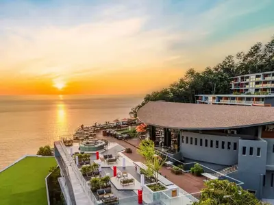 an aerial view of a resort with the ocean in the background at Kalima Resort and Spa in Patong Beach