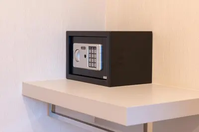 a microwave oven sitting on top of a shelf at Bangtao,Layan beach apartment in Bang Tao Beach