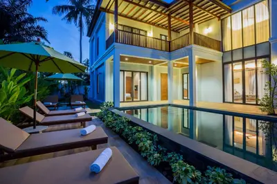 an exterior view of a villa with a swimming pool at Villa Palavee (B1) in Ao Nang Beach