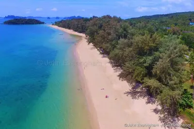 an aerial view of a beach with people on it at At Seacondo-Excellent-B26 in Klong Muang Beach