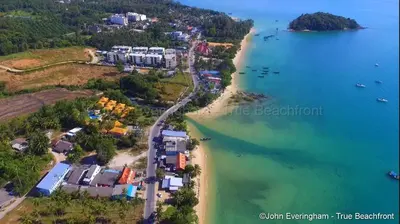 an aerial view of a beach with boats in the water at At Seacondo-1 Bedroom-A12 in Klong Muang Beach