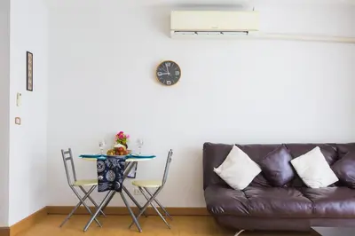 a living room with a couch and a table at At Seacondo-1 Bedroom-A20 in Klong Muang Beach