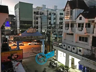 a view of a city street with buildings at Le Tanjong House in Patong Beach
