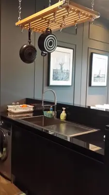 a kitchen with a sink and a counter with pots and pans at Modern Luxury King Suite Pool View Sauna 57sqm in Rawai Beach