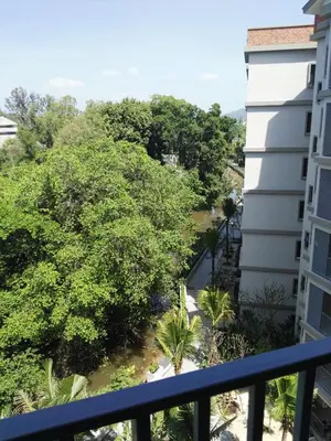 a view from the balcony of a condo at The Beach Residence by EHM in Nai Yang Beach
