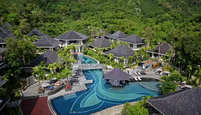 an aerial view of a resort with a swimming pool at Mandarava Resort and Spa, Karon Beach in Karon Beach