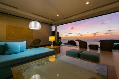 a living room with a view of the ocean at The heights Penthouse Ocean view A11 Near Kata Beach in Kata Beach