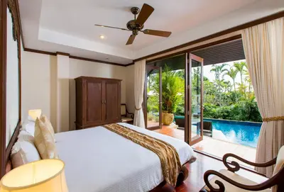 a bedroom with a bed and a large window at Katamanda Kata View villa E5 near kata Noi Beach in Kata Beach