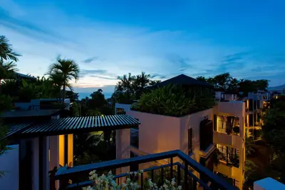 a view of a building with a plant on the top at Kata Gardens Penthouse sea view 4C near Kata Noi Beach in Kata Beach