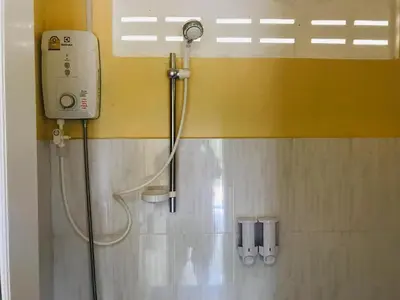 a shower in a bathroom with a shower at Koh Yao Candy House in Ko Yao Yai