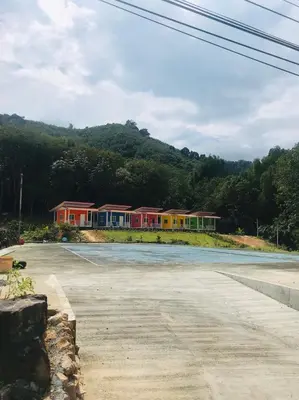 a row of houses on the side of a road at Koh Yao Candy House in Ko Yao Yai