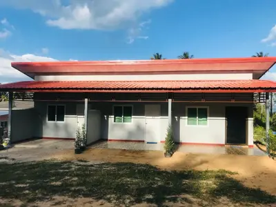 a small house with a red roof at Koh Yao Candy House in Ko Yao Yai