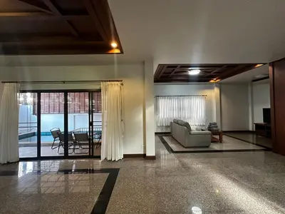 a living room with a couch and a table at Poonsiri Private Pool Villa Aonang in Ao Nang Beach