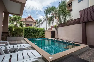 a swimming pool in the backyard of a house at Poonsiri Private Pool Villa Aonang in Ao Nang Beach